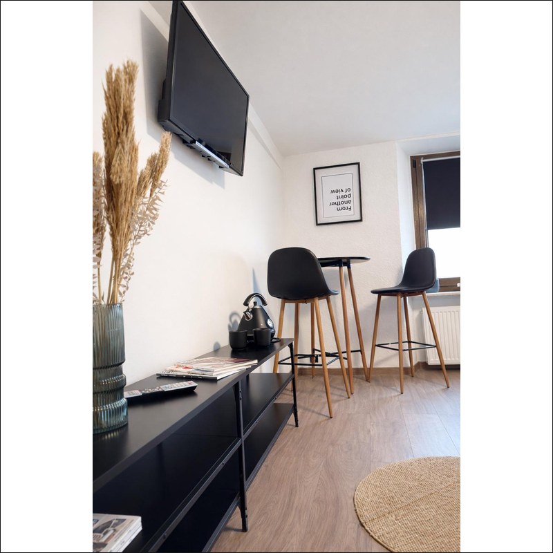 Quartier OG – TV-Bereich und Essbereich